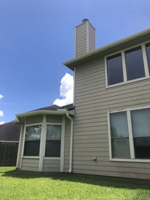 Home exterior with gutter and downspout