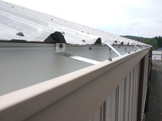 Close view of gutter detail along a roof edge